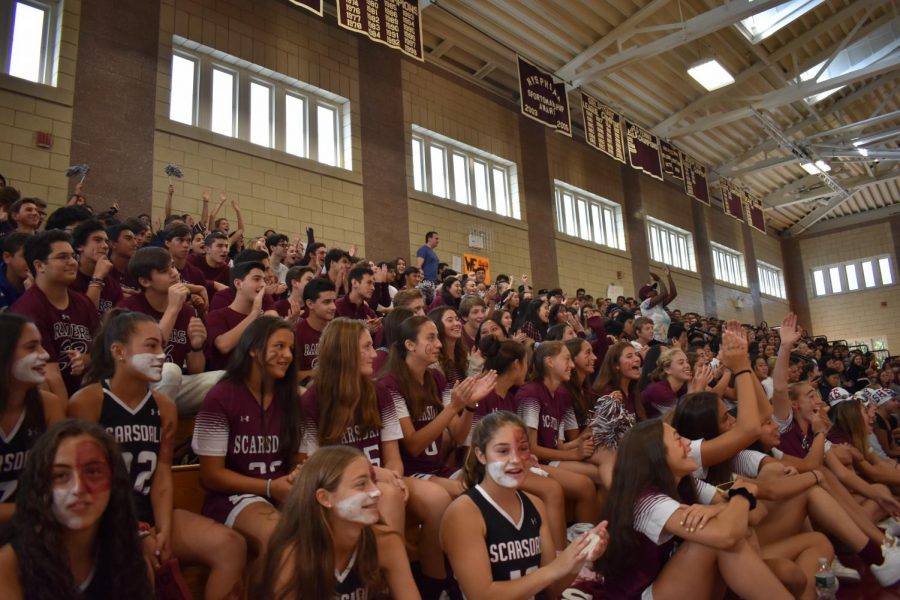 Students cheer on varsity sports team. Photo credit: Maroon Staff
