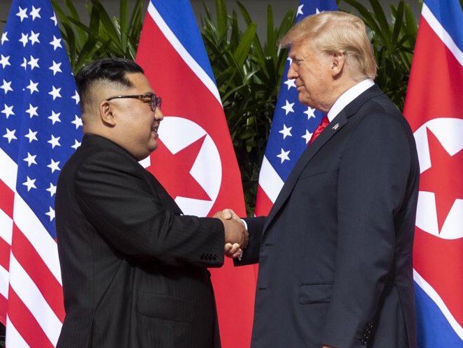 PIctured: Kim Jong Un and Donald Trump at their meeting this summer