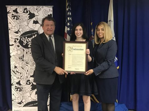 Kohn ’21 receiving her proclamation when she was appointed as Westchester's first Youth Poet Laureate.