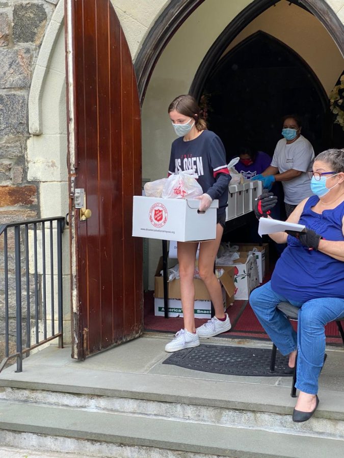 Scarsdale Sophomore Lydia Doherty delivering food to the Salvation Army.