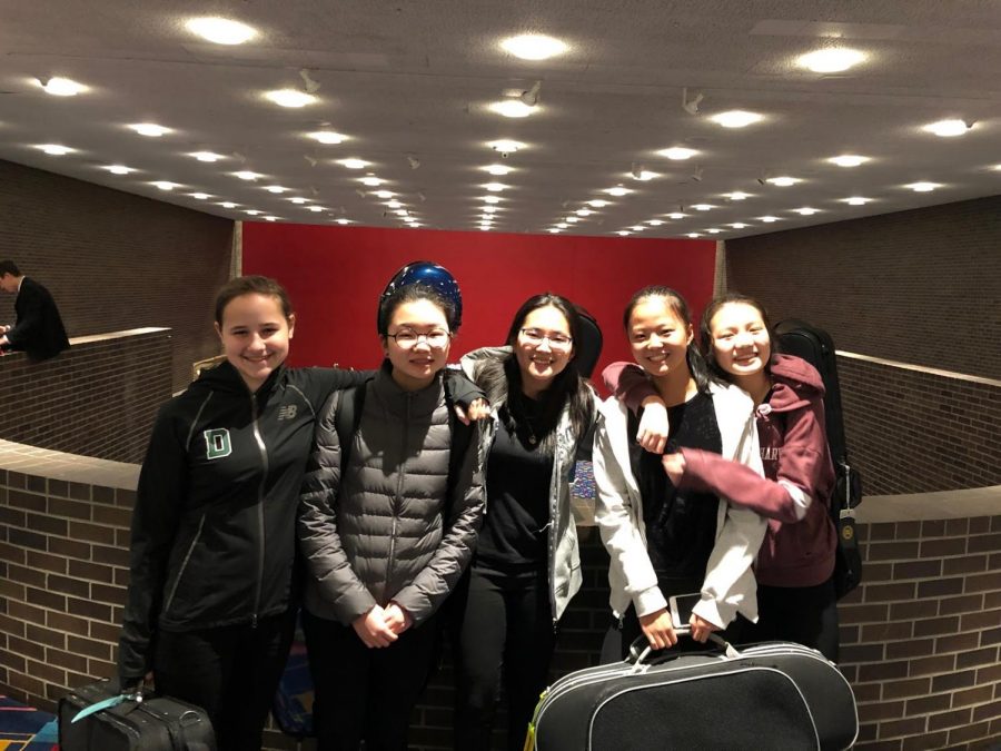 Karen Lee (second from left), Vivan Guo (center), and Joanna Wang (far right) at All County Orchestra two years ago. 