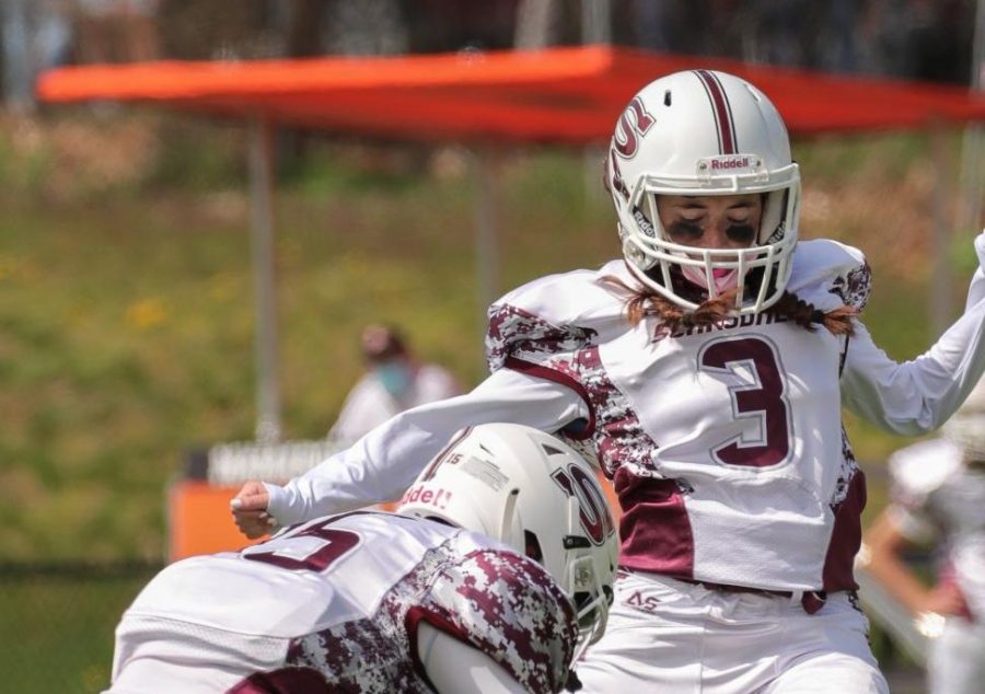 Ryan Silberfein 21 makes history as Scarsdale footballs first female varsity player.