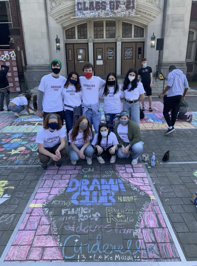 SHSs Drama Club creating a drama themed chalk art.