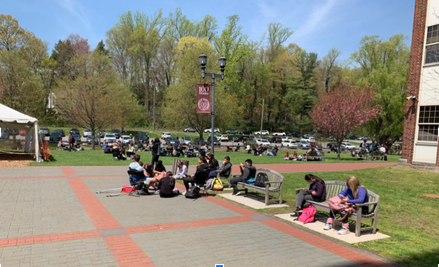 Students taking advantage of the nice weather during their lunch period. 
