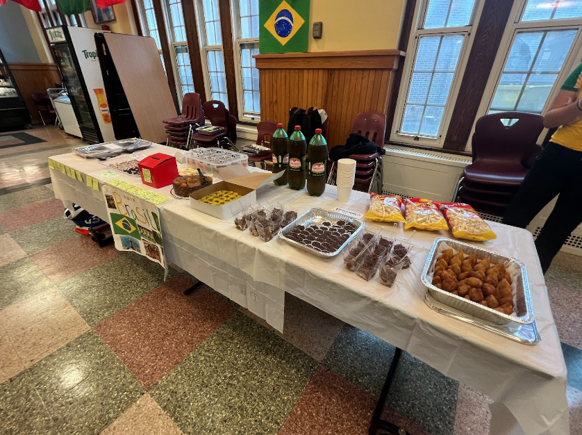 The Brazil table set with traditional Brazilian foods and desserts. 
