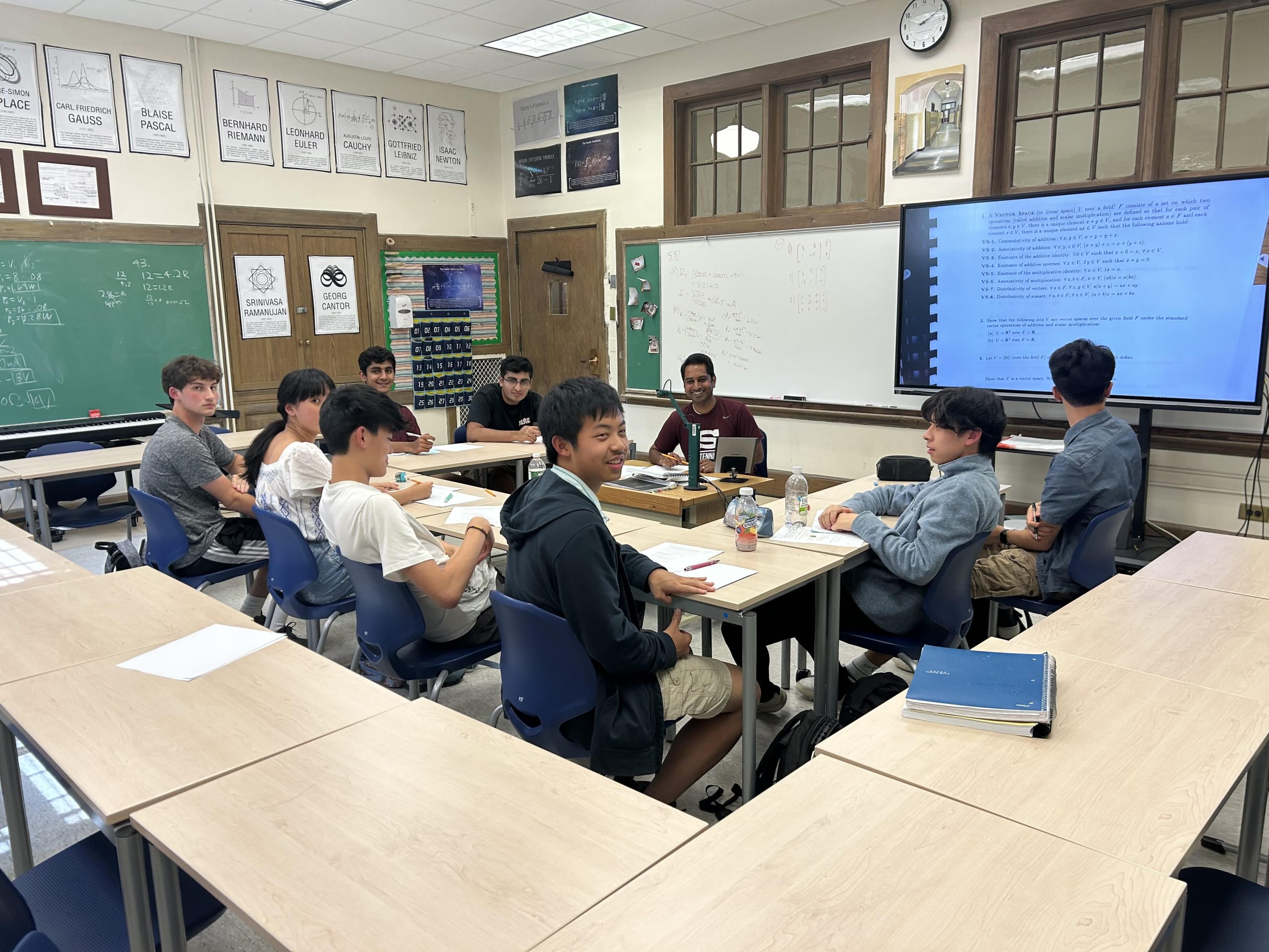 Students in AT Multivariable Calculus partaking in a class discussion.