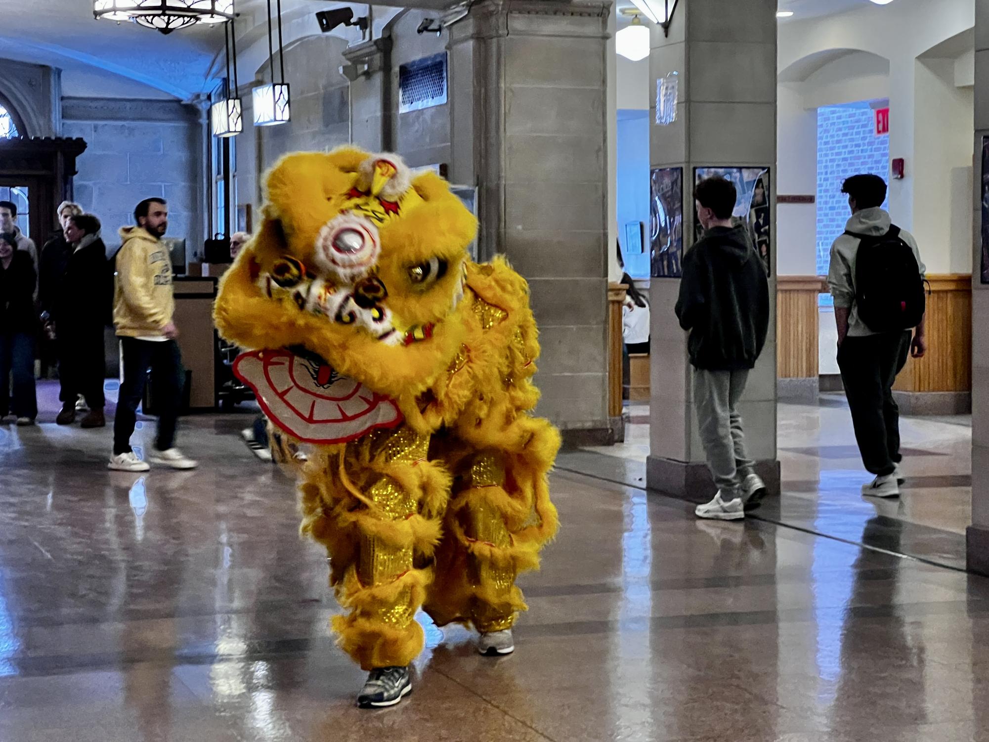 Chinese Lion Dance in the Brewster Commons during the Chinese Culture Club's Lunar New Year Celebration.