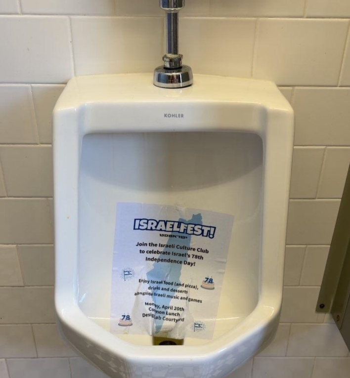 A screenshot of [@tanyasingerknits]'s Instagram post features the defiled poster placed in a urinal.